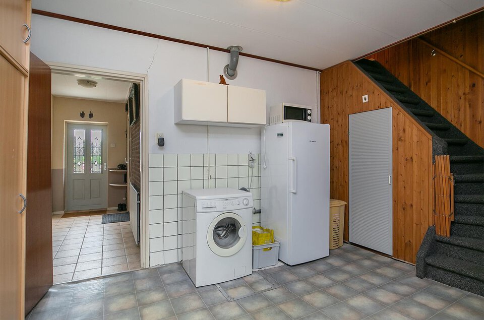 Kembrugweg 1 SCHUINESLOOT